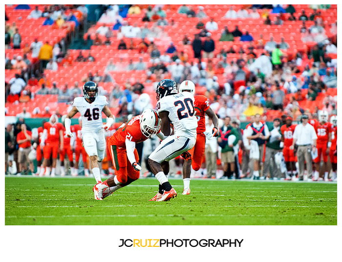 Antonio Crawford, #21 Hurricanes, tackles Cavalier #20 Tim Smith on a punt return