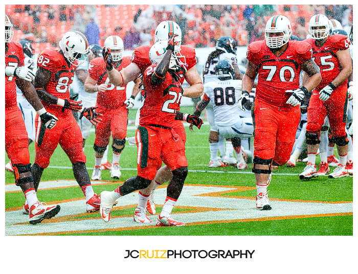 #25, Hurricanes RB Dallas Crawford, celebrates his touchdown with teammates