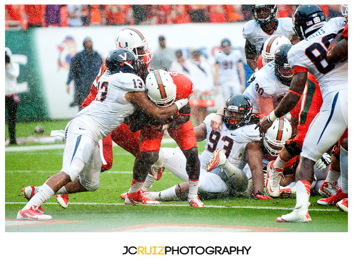 Miami RB #25, Dallas Crawford, rushes into the endzone for a touchdown