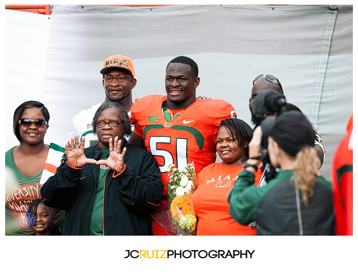 #51, Shayon Green, poses with family prior to the game for Senior Day
