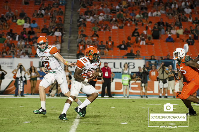 Tysean Holloway receives the handoff