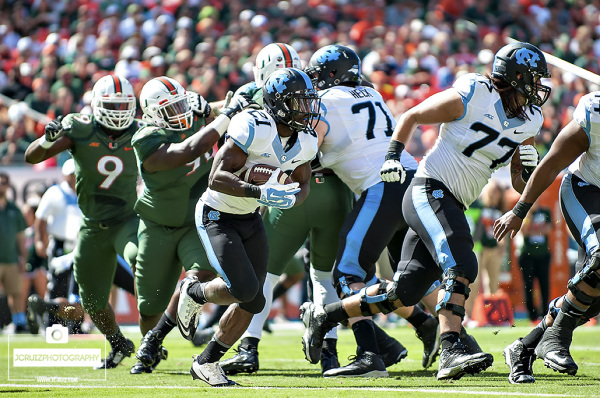 Romar Morris rushes the ball