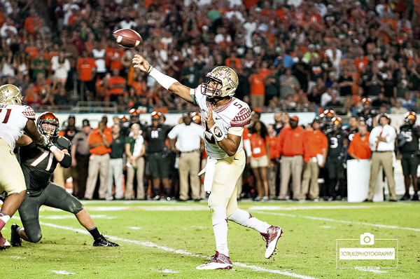 Florida State QB #5 Jameis Winston throws a pass