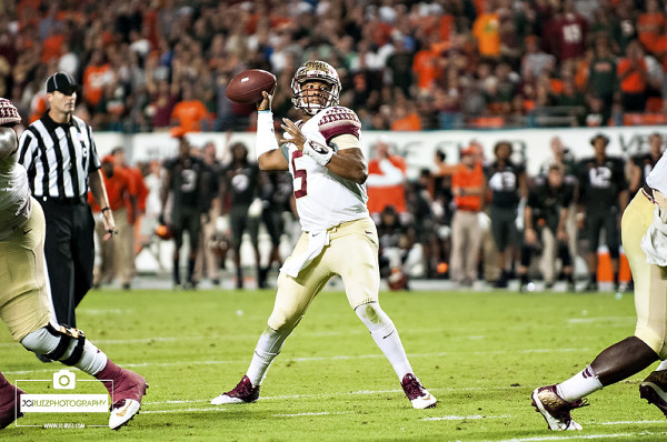 Florida State QB #5 Jameis Winston attempts a pass against the Miami hurricanes