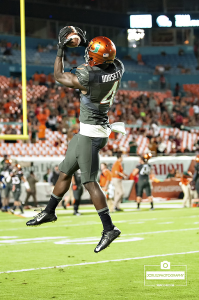 Miami WR #4 Phillip Dorsett makes an acrobatic grab during pre-game drills