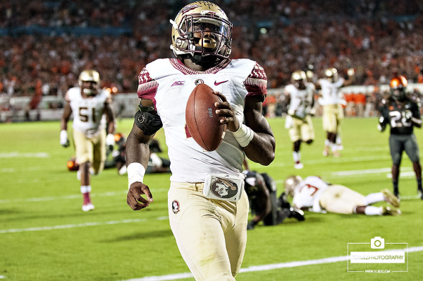 Florida State RB #4, Dalvin Cook, scores the game winning touchdown against the Miami Hurricanes