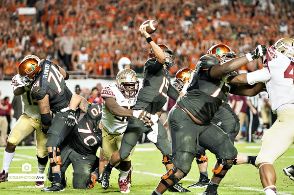 Miami Hurricanes QB #15, Brad Kaaya, attempts a pass on the game's final drive