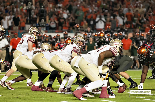 Florida State QB #5 Jameis Winston calls an audible at the line of scrimmage