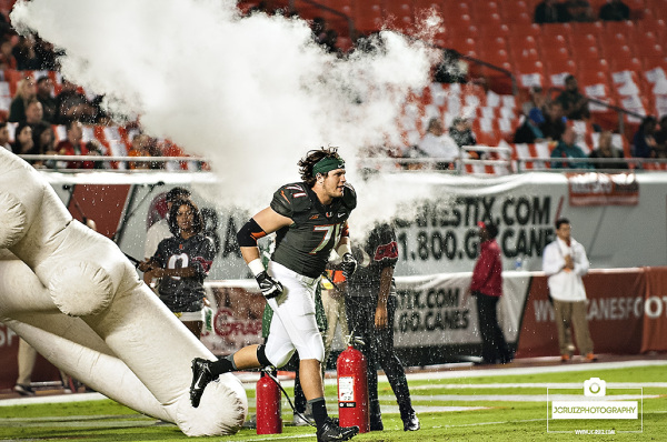 Anthony Chickillo runs out on Miami Hurricanes Senior Day