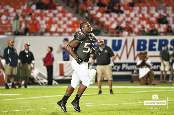Denzel Perryman runs onto the field for Miami Hurricanes Senior Day
