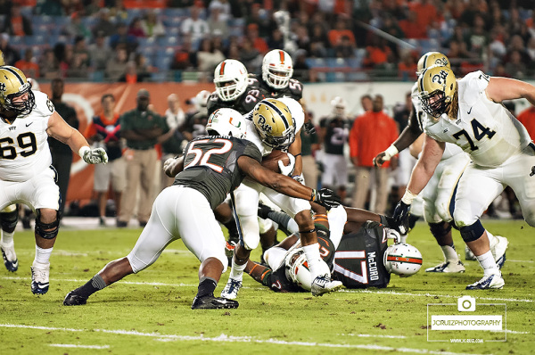 Denzel Perryman makes a tackle