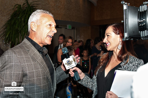 Sports reporter Steve Shapiro speaks to a reporter