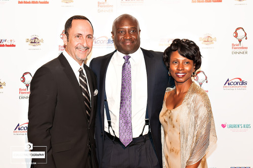 Eric Reid with Randal "The Thrill" Hill and his wife