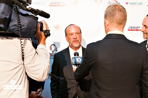 Ron Book talking to the media