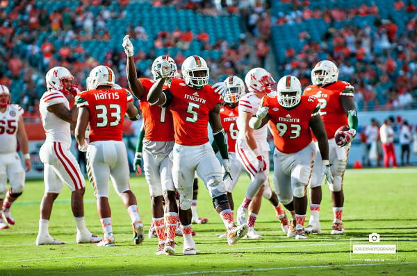 Jermaine Grace celebrates a tackle for a loss