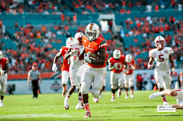 Joseph Yearby runs for a touchdown