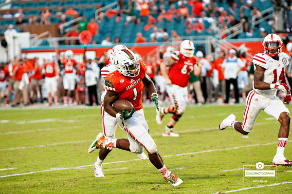 Mark Walton runs against Nebraska