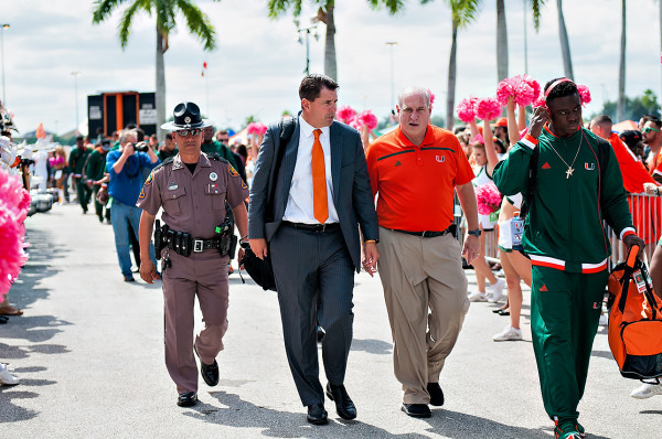Miami head coach, Al Golden, walks to the stadium