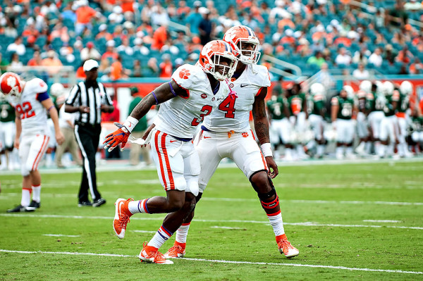 Clemson WR #3, Artavis Scott, and QB #4, Deshaun Watson, celebrate a touchdown against Miami