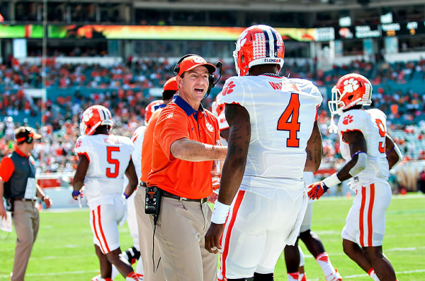 Clemson head coach, Dabo Swinney, congratulates QB #4, Deshaun Watson, on his touchdown pass