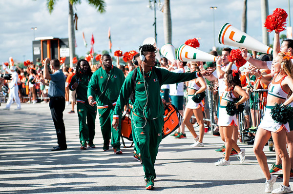Miami Hurricanes safety #2, Deon Bush, greets fans along the Hurricane Walk