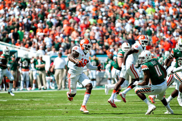 Clemson Tigers safety #18, Jadar Johnson, runs back an interception against the Miami Hurricanes