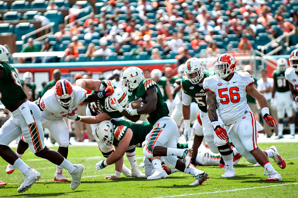 Miami Hurricanes RB #2, Joe Yearby, rushes against the Clemson Tigers