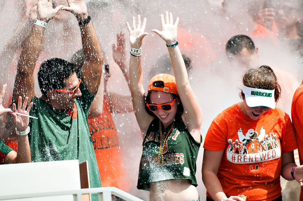 Miami Hurricanes student section gets sprayed with smoke after the end of the first quarter
