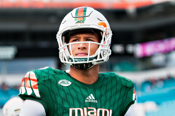Miami Hurricanes QB #15, Brad Kaaya, looks out to the field as he walks to the coin toss