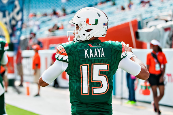Miami Hurricanes QB #15, Brad Kaaya, takes practice throws