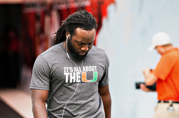 Miami Hurricanes safety, Dallas Crawford, walks out to warm ups