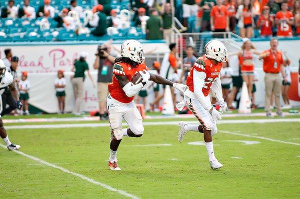 Safety Jamal Carter points out blocks after intercepting a pass