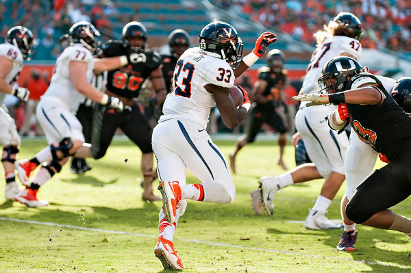Virginia RB Olamide Zaccheaus cuts back inside against the Miami defense