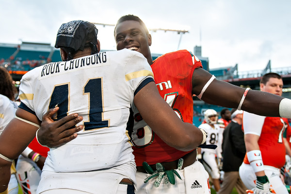 David Njoku and Rod Rook-Chungong greet each other after the game