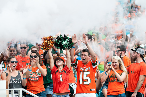 The Hurricanes student section get sprayed with Smoke from Sebastian