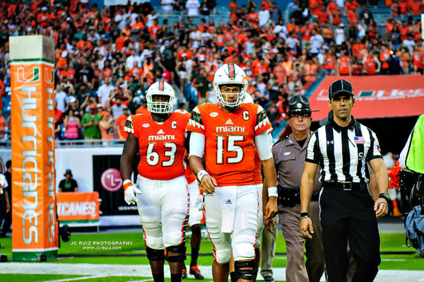 The game day captains walk out to midfield