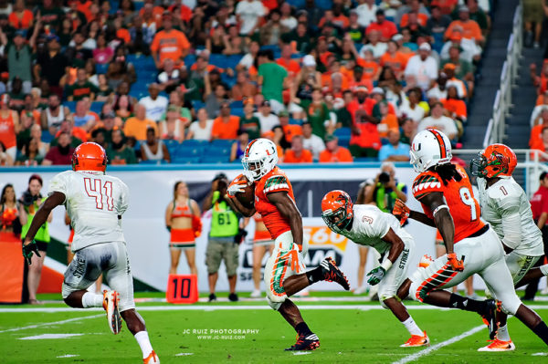 Hurricanes RB, Mark Walton, splits defenders