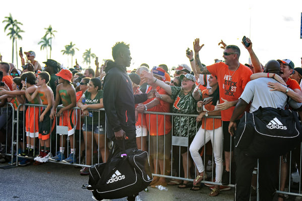 Hurricanes TE, David Njoku, greets fans