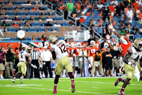 Florida State QB, Deondre Francois, attempts a pass