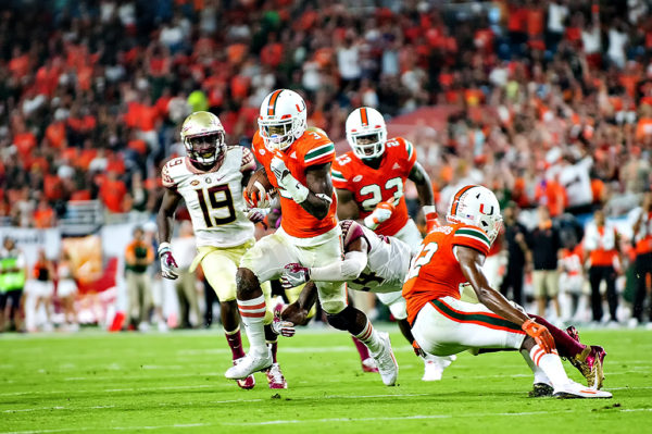 Hurricanes WR, Stacy Coley, runs after a pass from Brad Kaaya