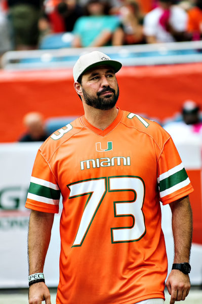 2001 National Champion, Joaquin Gonzalez, walks to the field as the honorary captain