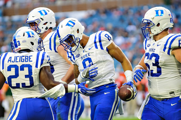 Duke WR, Aaron Young, celebrates with teammates
