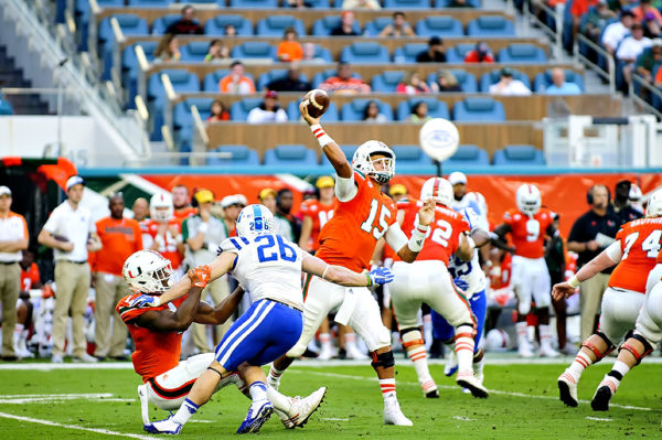 Brad Kaaya throws from the pocket