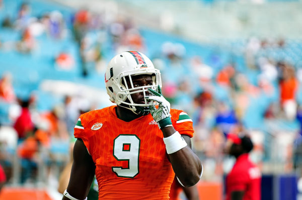 Chad Thomas looks at the scoreboard during warmups