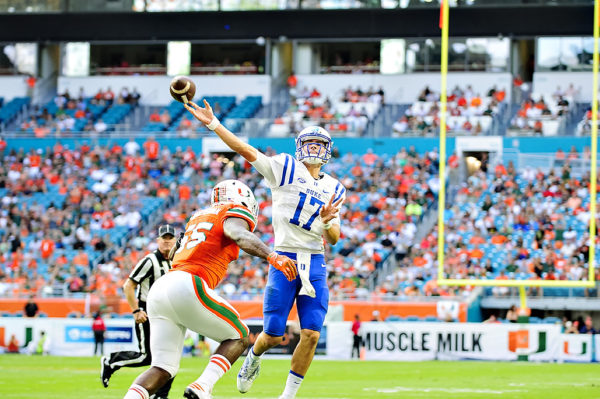 Duke QB, Daniel Jones, throws on the run