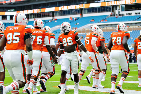 David Njoku greets his teammates