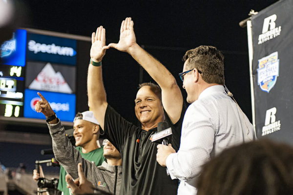 Mark Richt throws up the U at the conclusion of his interview