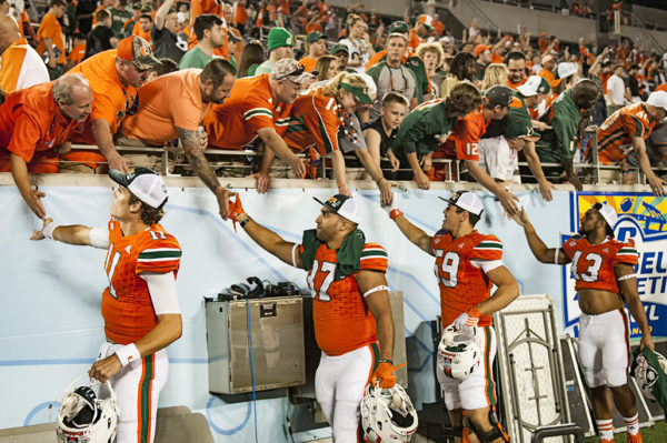 Miami Hurricane players thank the fans for all their support