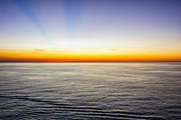 The colors of sunrise over the ocean near the Bahamas