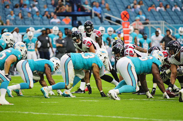 The Dolphins DL lines up against the Falcons